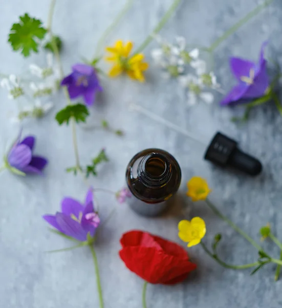 Glass Bottle Face Oil Wildflowers Marble Board Top View Beauty — Stock Photo, Image