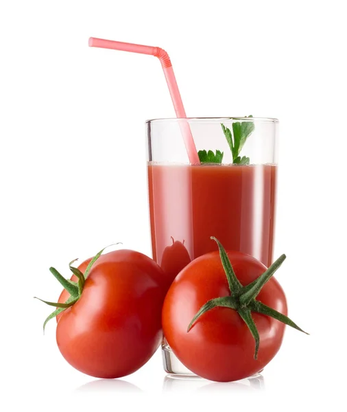 Un vaso de jugo de tomate fresco con tomates Fotos De Stock