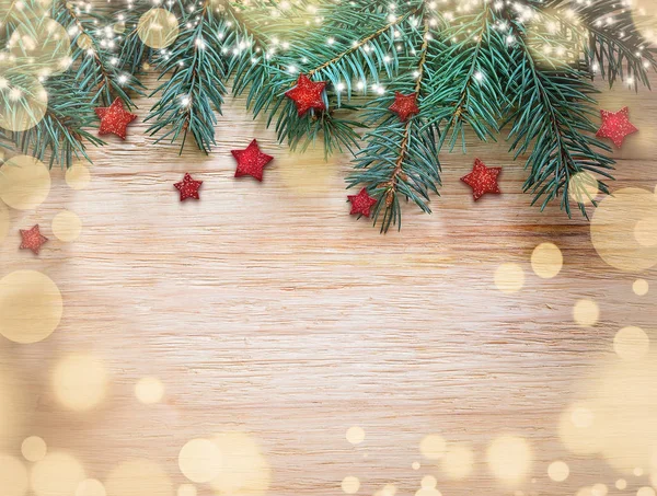 Kerstdecoratie. Rode ster op houten achtergrond — Stockfoto
