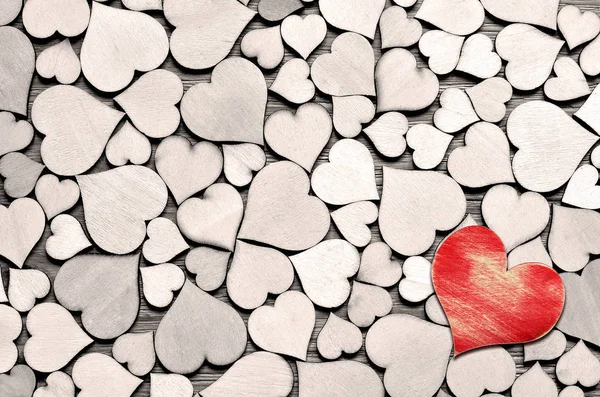 Bakgrund som skapats från röda och grå trä hjärtan — Stockfoto