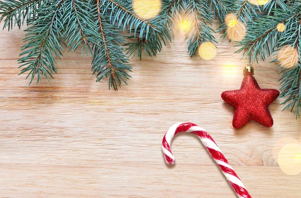 Kerstdecoratie. Rode ster op houten achtergrond — Stockfoto