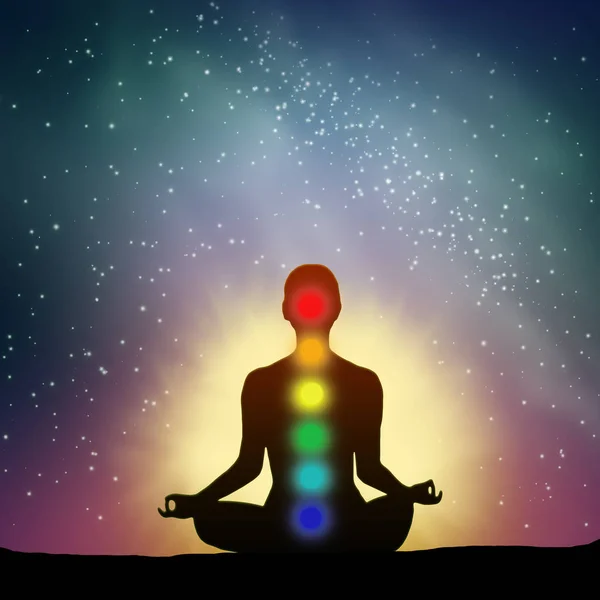 Gece gökyüzü yıldızlarla dolu ve yoga yapan bir insan silueti.