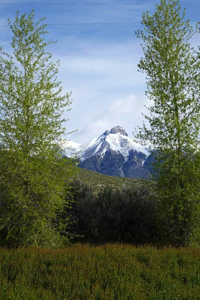 Mt. McCaleb in Idaho\'s Lost River Mountain Range, provides a beautiful background for the town of Mackay.