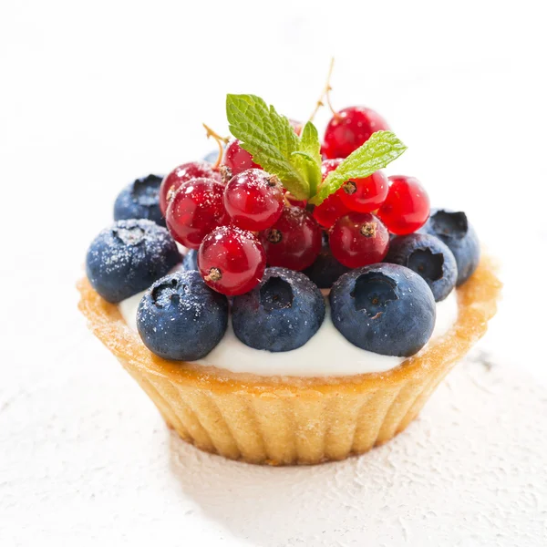 Mini tart with cream and berries on white background, closeup — Stock Photo, Image