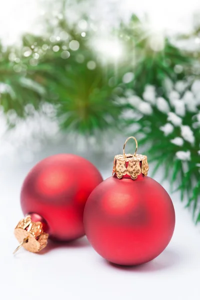 Red Christmas balls and light bokeh — Stock Photo, Image