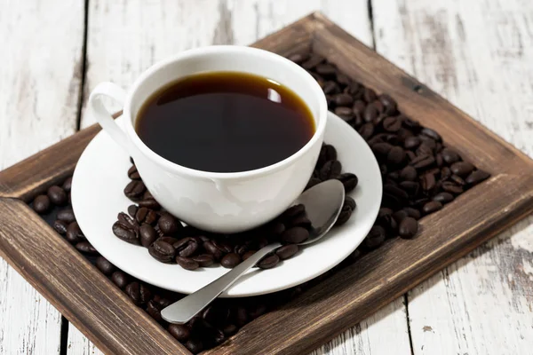 Cup of coffee on a wooden tray — Stock Photo, Image
