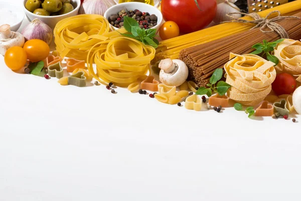 Ingredients for cooking pasta and white background — Stock Photo, Image