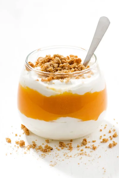 Dessert with pumpkin, whipped cream and cookies on white table — Stock Photo, Image