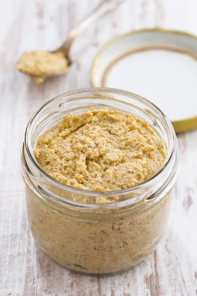 Homemade mustard in a glass jar, top view — Stock Photo, Image