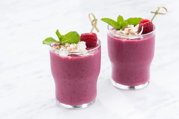 Berry smoothie in a glass beakers — Stock Photo, Image