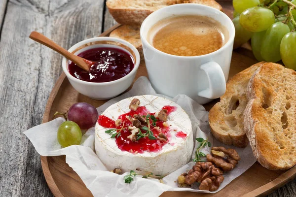 Gourmet breakfast- camembert with berry jam, toast, coffee — Stock Photo, Image