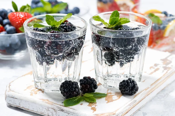 carbonated drinks with berries, closeup