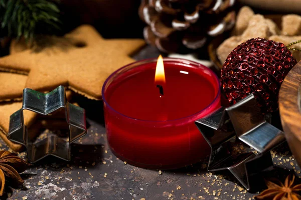 Přísady pro pečení vánočního cukroví a svíčka, closeup — Stock fotografie