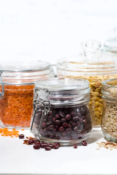 Assortment of various cereals and legumes, vertical — Stock Photo, Image