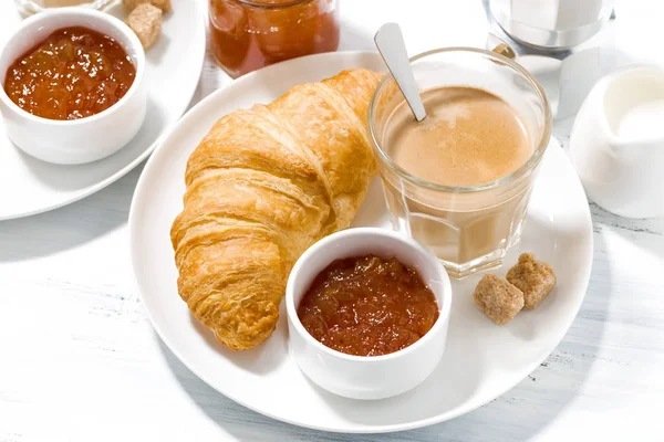 Coffee with milk and croissants with jam for breakfast, top view — Stock Photo, Image