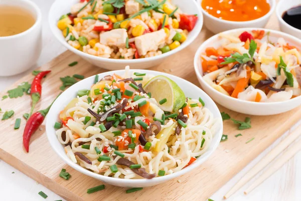 Lunch -noodles with vegetables and greens, fried rice with tofu — Stock Photo, Image