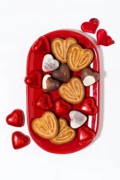 Plate with cookies and candies for St. Valentine's Day — Stock Photo, Image