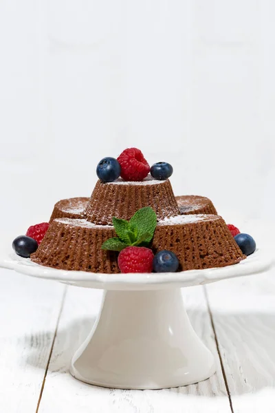 Portioned chocolate muffins, vertical — Stock Photo, Image