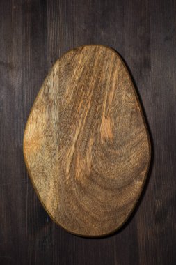 Tasarım için arkaplan olarak ahşap kesme tahtası, üst görünüm