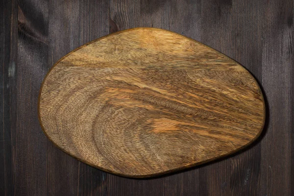 Tabla de cortar de madera como fondo para el diseño — Foto de Stock
