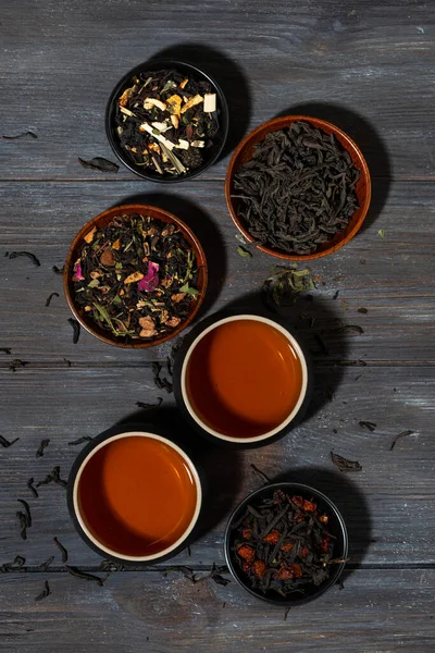 Assortment Fragrant Tea Black Floral Herbal Drinks Wooden Background Top — Stock Photo, Image