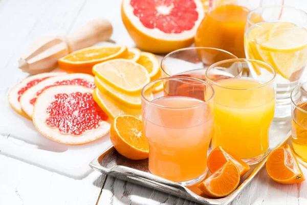 Fresh Citrus Juices White Table Top View Horizontal — Stock Photo, Image