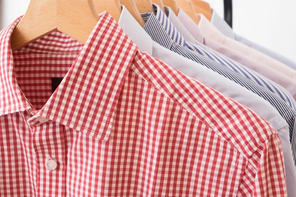 Camisas en varios colores y texturas —  Fotos de Stock