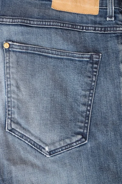 Primer plano de un bolsillo vaquero azul —  Fotos de Stock
