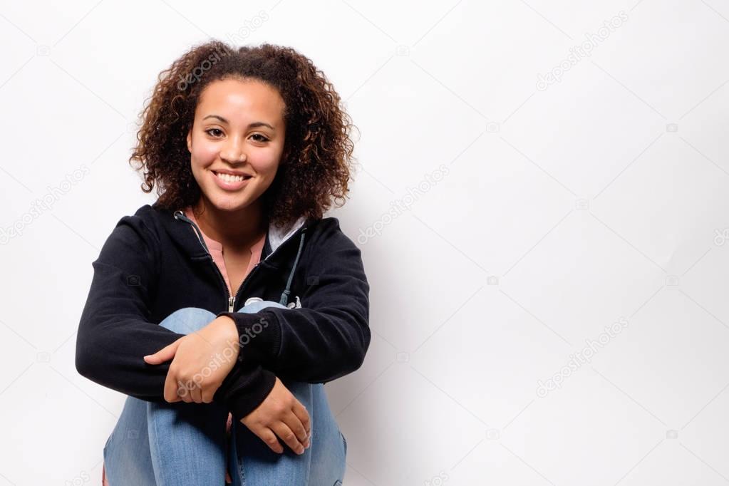 Happy afro-american woman isolated on background