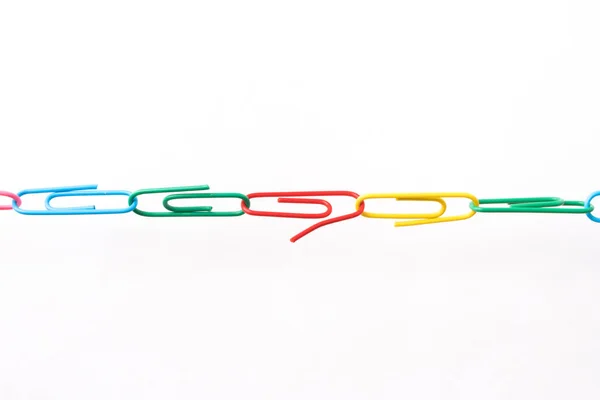 Chain made of paper clips meaning teamwork and cooperation — Stock Photo, Image