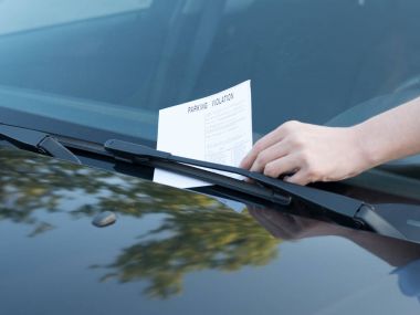 Parking violation ticket fine on windshield clipart