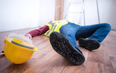 Painful worker after on the job injury clipart