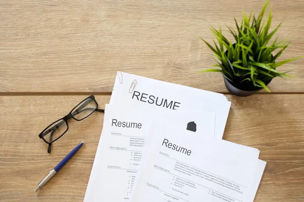 Resume applications on the desk ready to be reviewed — Stock Photo, Image