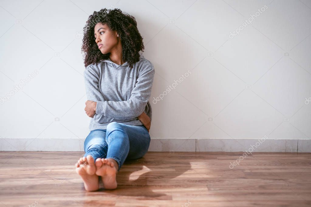 Young girl in trouble feeling sad and depressed