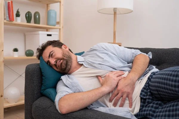 Man Lying Sofa Feeling Pain Stomachache — Stock Photo, Image