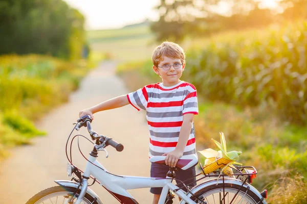 Shool kid boy having fun with riding of bicycle — Stock Photo, Image