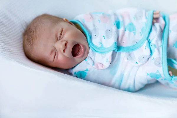 Cute little newborn baby girl wrapped in blanket — Stock Photo, Image