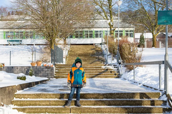 Little school kid boy of elementary class walking to school. — Stock Photo, Image