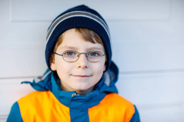 Portrait of little cute school kid boy with glasses — Stock Photo, Image
