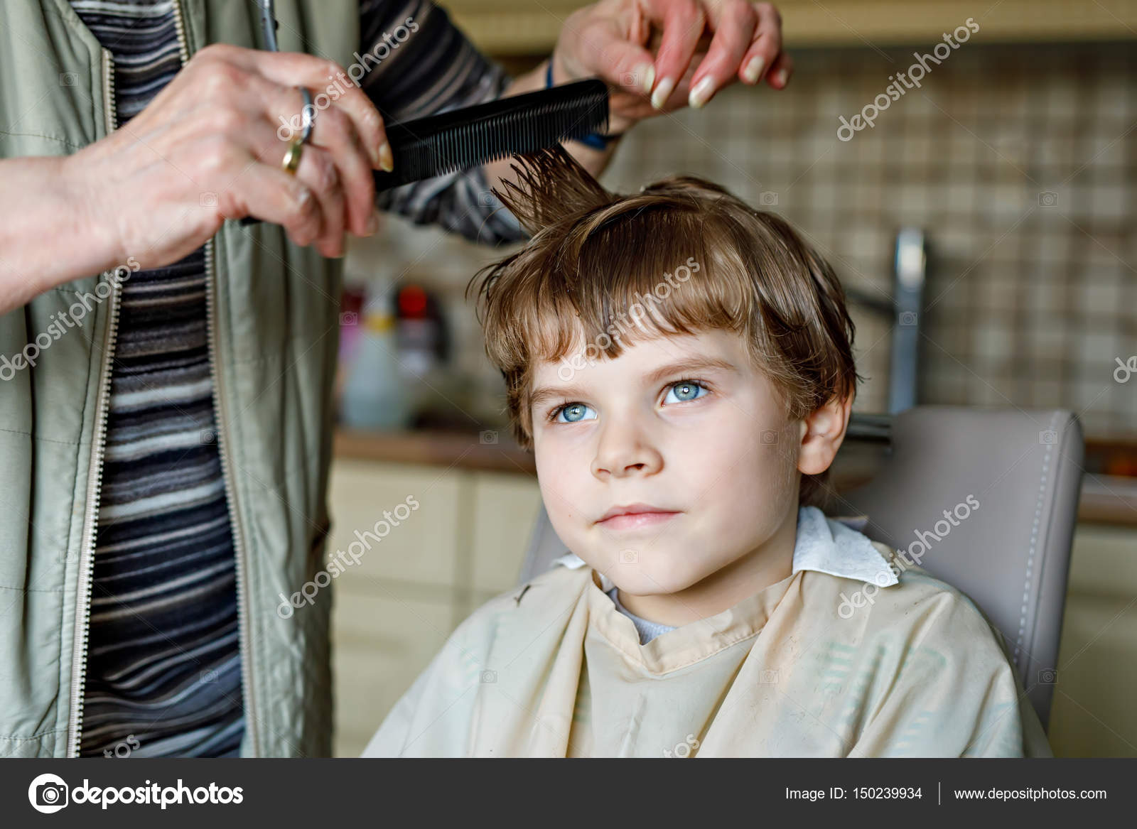 Beautiful Kid Boy With Blond Hairs Getting His First Haircut