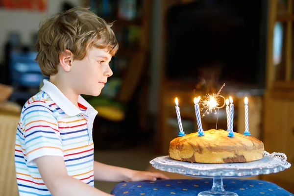 Adorable happy blond little kid boy celebrating his birthday. — Stock Photo, Image