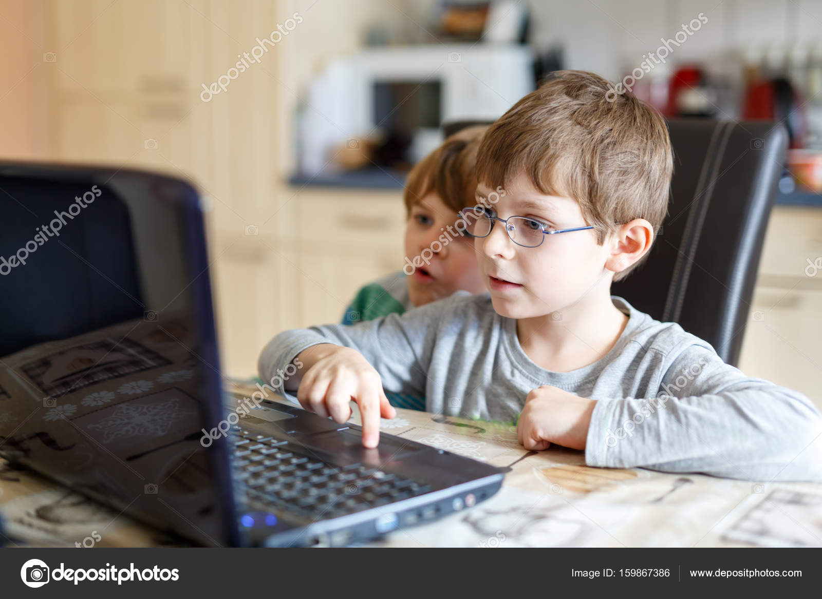 pics Little Kid On Computer Stock Image https depositphotos com 159867386 stock photo two kids boys playing online html