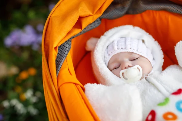 Portrait of adorable newborn baby in warm winter clothes — Stock Photo, Image