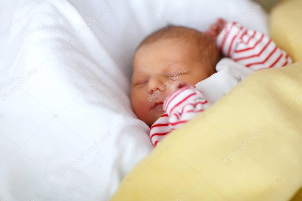 Portrait of cute adorable newborn baby girl sleeping