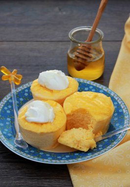 Souffle with cottage cheese and carrot with sour cream and honey. Delicious and healthy breakfast for the whole family clipart