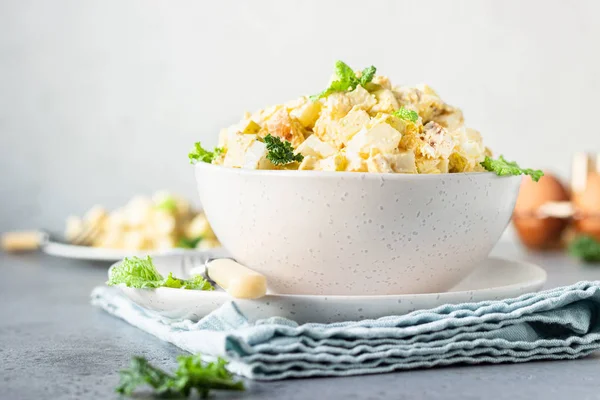 Healthy chicken salad with egg, apple and daikon. Keto diet.