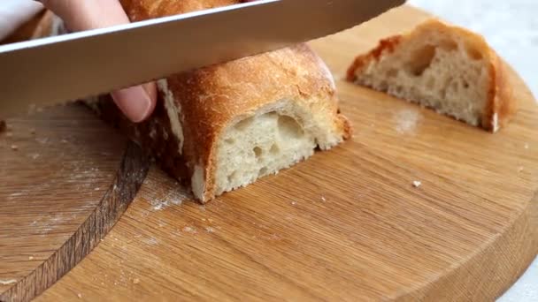 Woman Slicing Sourdough Bread Wooden Cutting Board Closeup View — Stock Video