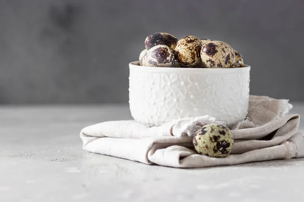 White Ceramic Bowl Quail Eggs Napkin Light Grey Stone Background — Stock Photo, Image