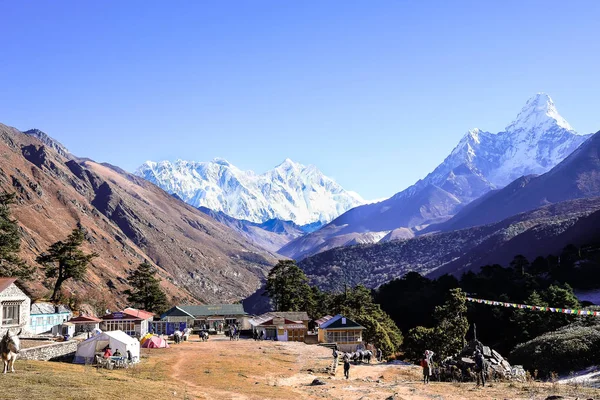 Landscape with the Himalayan mountains in the background on the way to the Everest base camp, Khumbu region in Nepal. Image with copy space. Mountain background. Everest base camp trail.