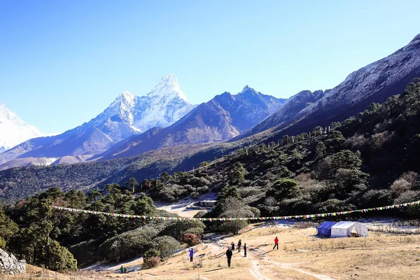 Landscape with the Himalayan mountains in the background on the way to the Everest base camp, Khumbu region in Nepal. Image with copy space. Mountain background. Everest base camp trail.